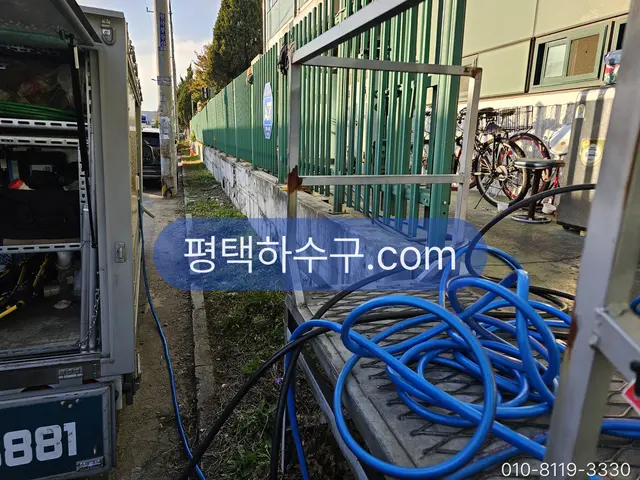 High-Pressure Jetting — Jetter and hose staged to match the run length